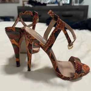 Steve Madden snake print heels.